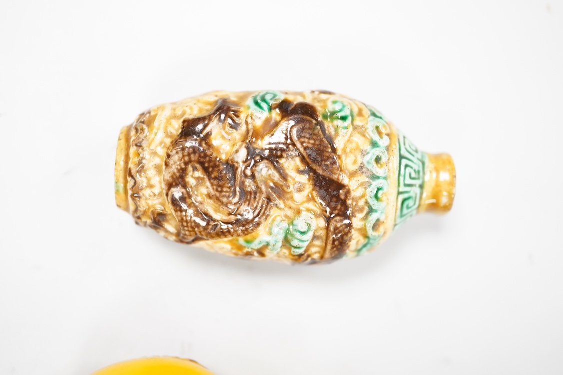Three Chinese glass snuff bottles and a porcelain snuff bottle(4), tallest 8cm high